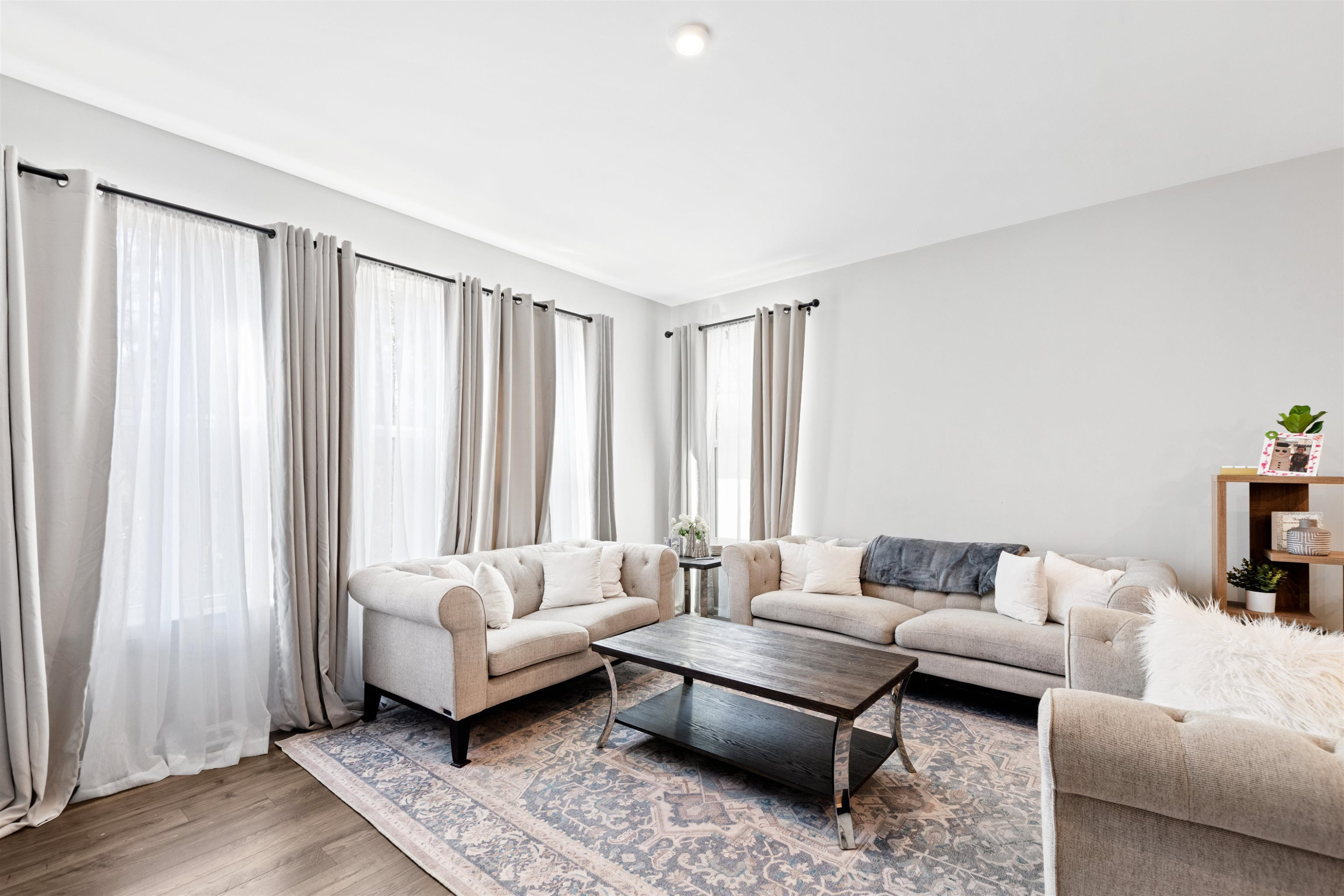 1636 Brussels Drive Apex, NC 27502 - Photo 16 of 35 a living room with furniture and a large window