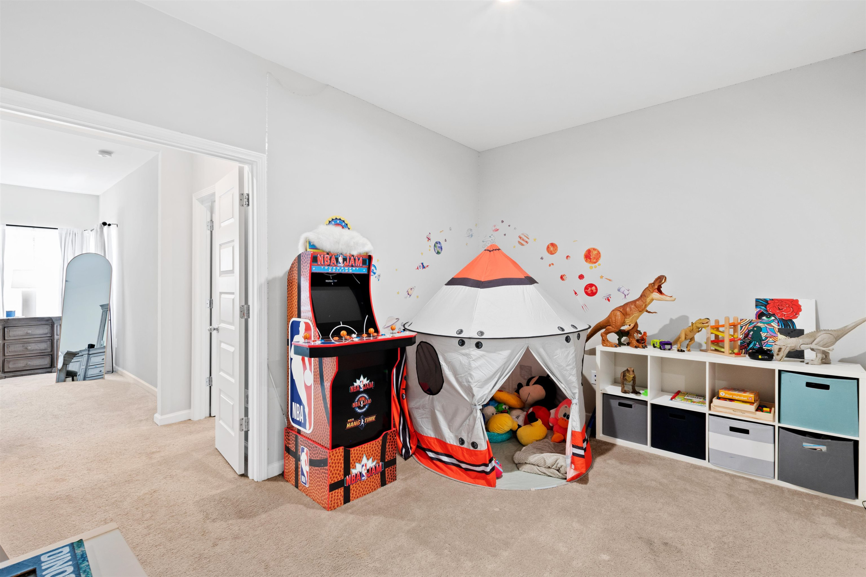 1636 Brussels Drive Apex, NC 27502 - Photo 18 of 35 a children room with toys and a white walls