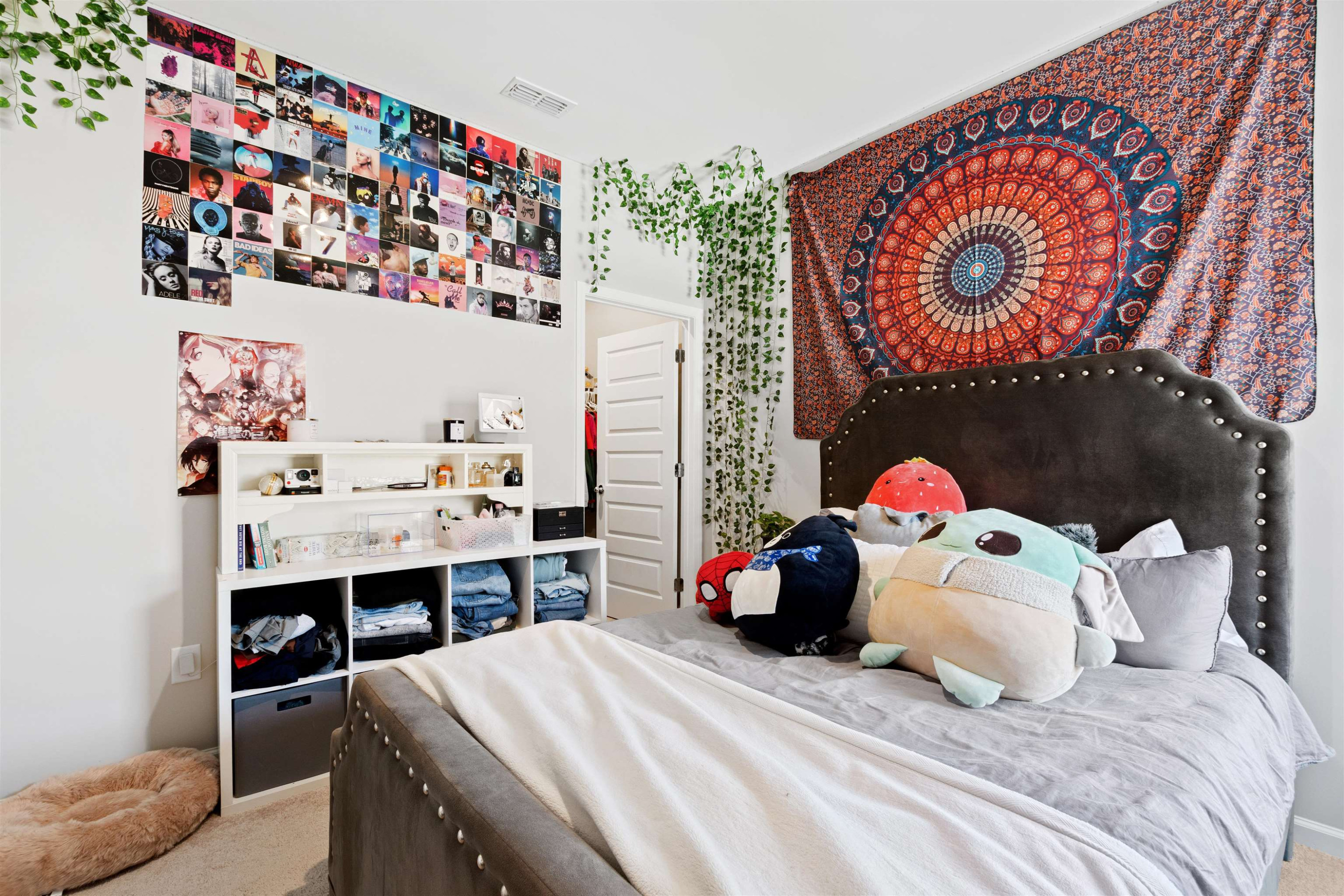 1636 Brussels Drive Apex, NC 27502 - Photo 27 of 35 a bedroom with a bed and a window