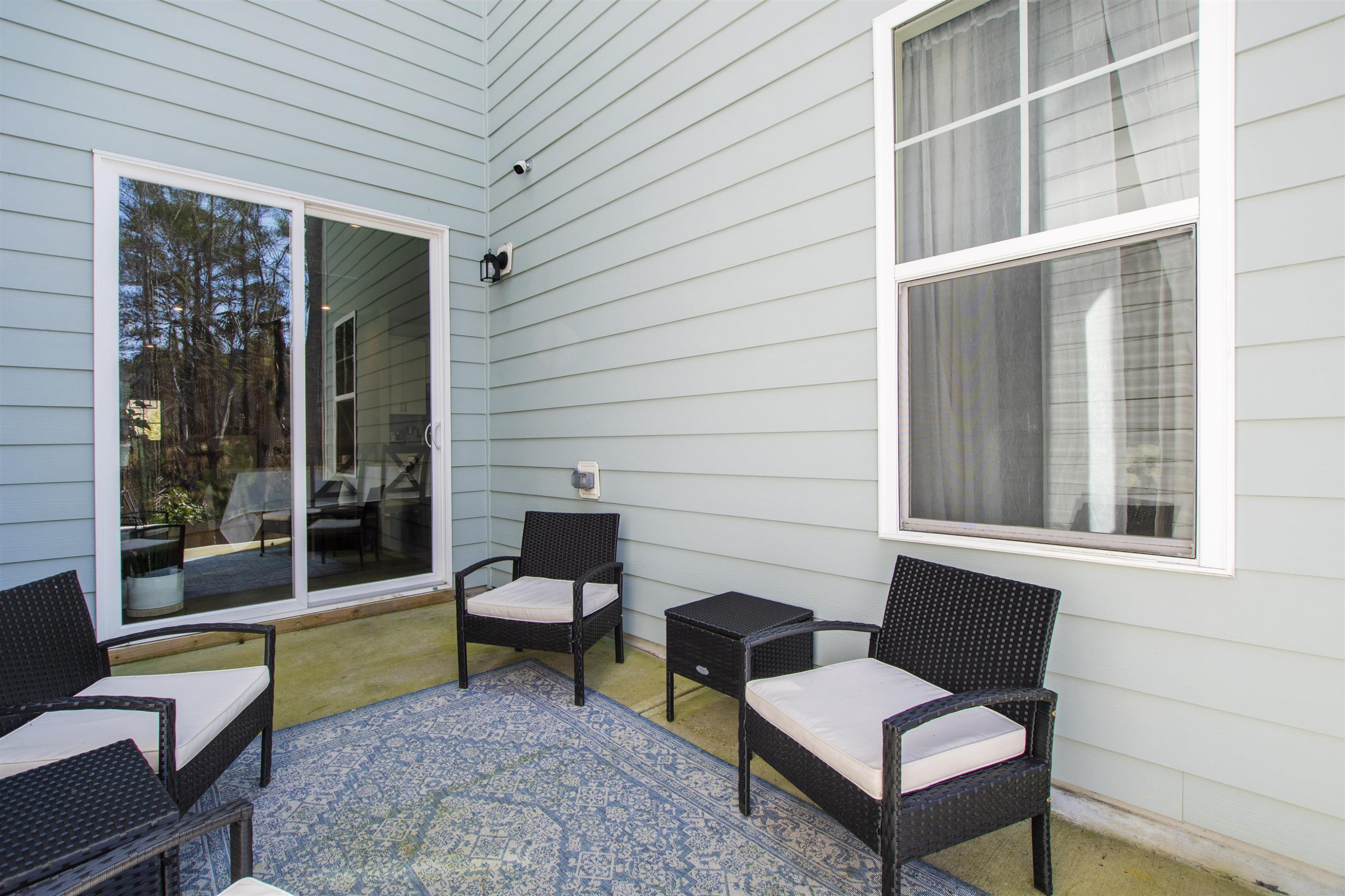 1636 Brussels Drive Apex, NC 27502 - Photo 33 of 35 a building outdoor space with patio furniture