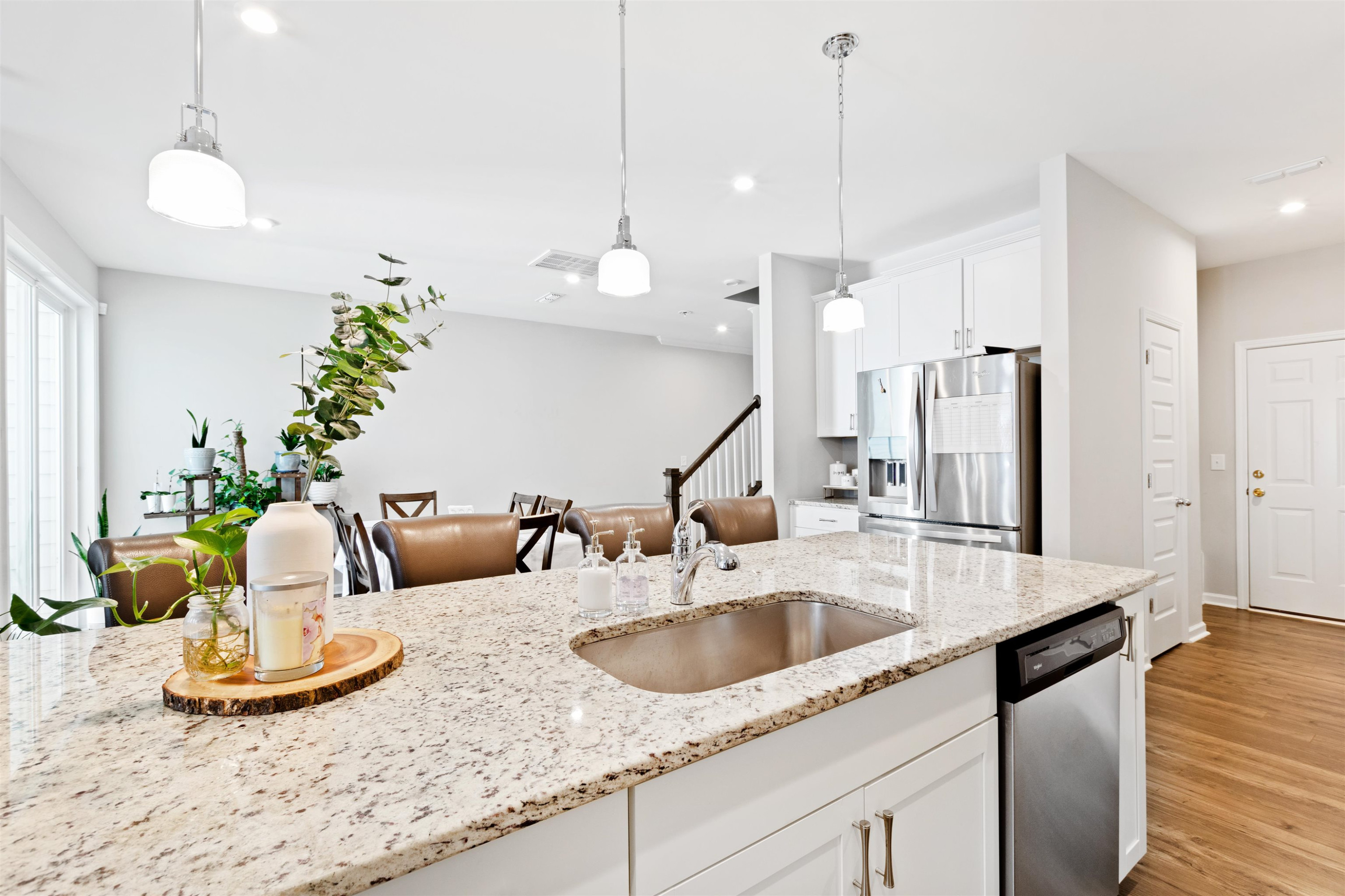 1636 Brussels Drive Apex, NC 27502 - Photo 9 of 35 a kitchen with sink and refrigerator