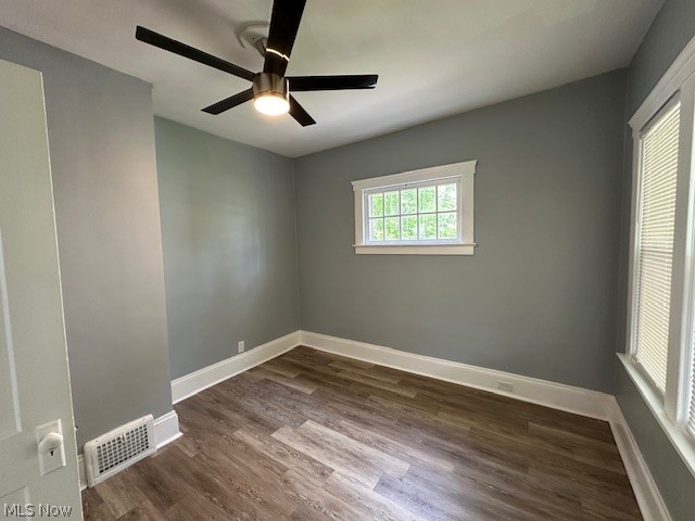 1388 Brookline Road Cleveland, OH 44121 - Photo 22 of 30 Spare room with dark hardwood / wood-style flooring and ceiling fan