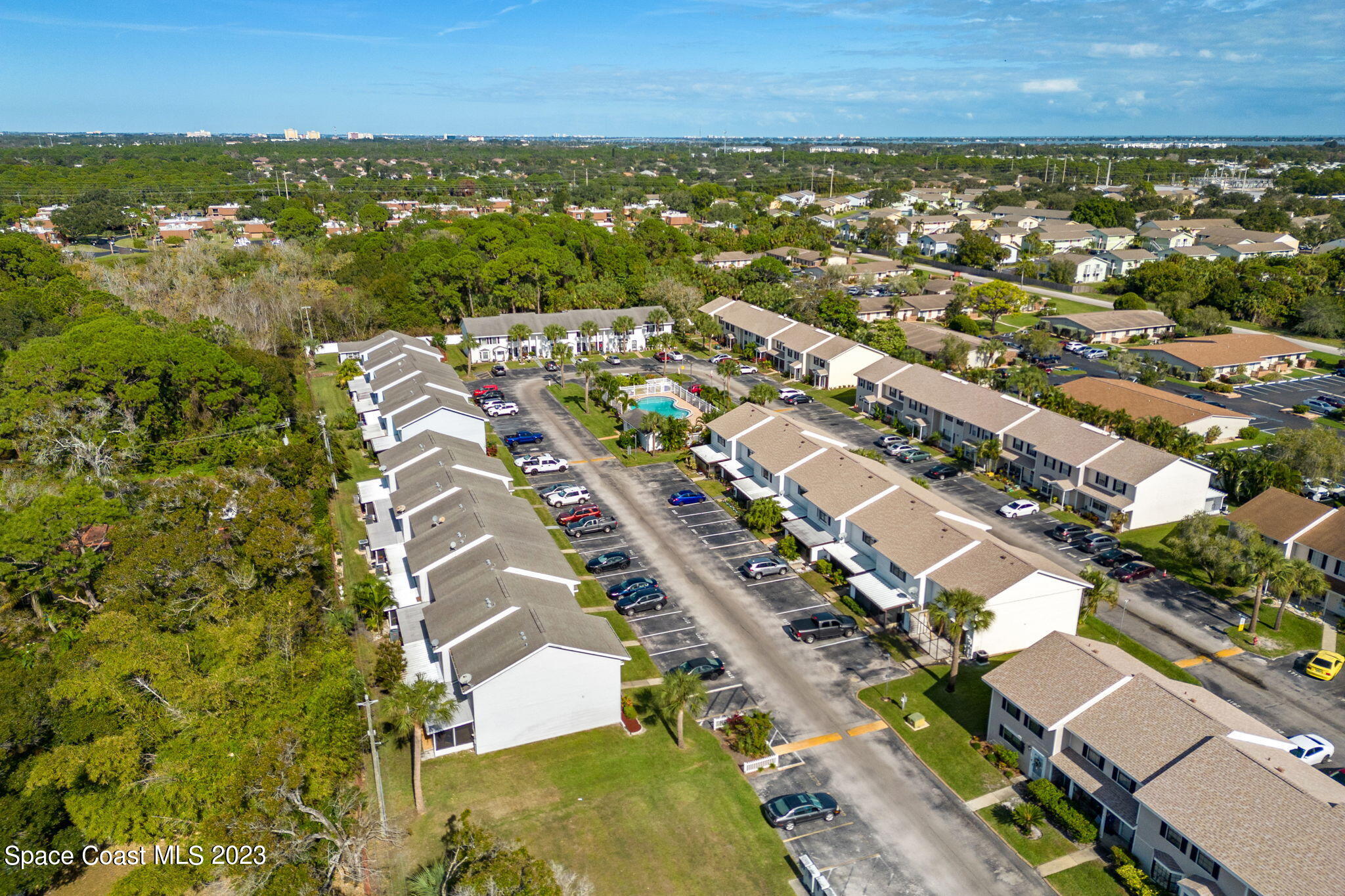 2717 Manor Drive Northeast Palm Bay, FL 32905 - Photo 17 of 21 an aerial view of residential houses with outdoor space