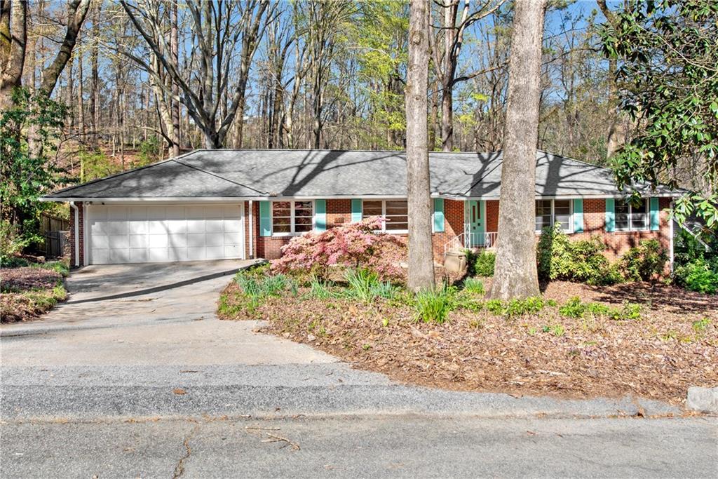 998 Vistavia Circle Decatur, GA 30033 - Photo 1 of 1 a front view of a house with garden