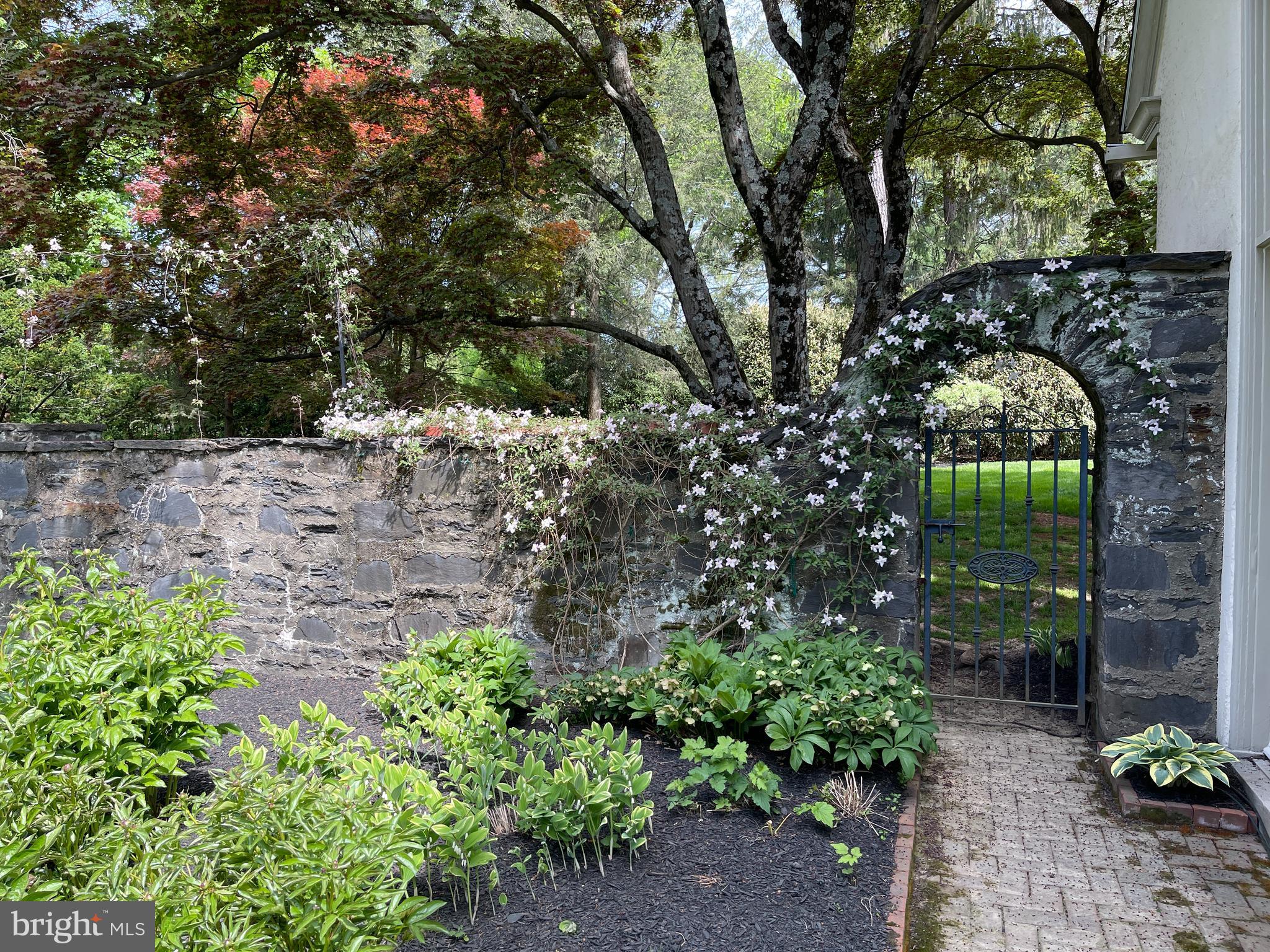 675 Church Road Wayne, PA 19087 - Photo 16 of 57 Gate from Walled Garden out to Driveway