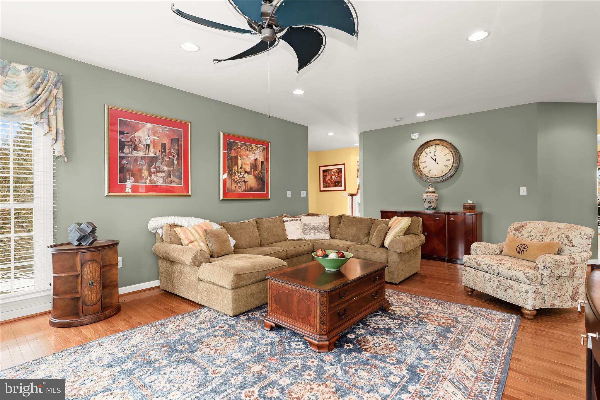 8061 Hunterbrooke Lane Fulton, MD 20759 - Photo 16 of 90 a living room with furniture and a window