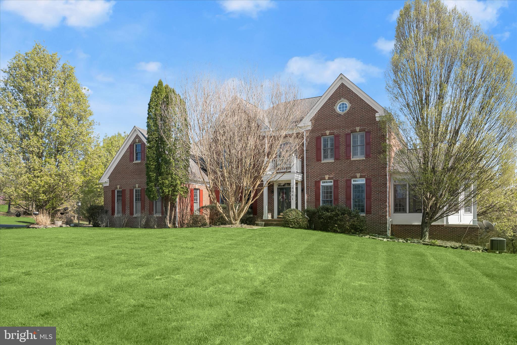 8061 Hunterbrooke Lane Fulton, MD 20759 - Photo 2 of 90 a front view of a house with garden