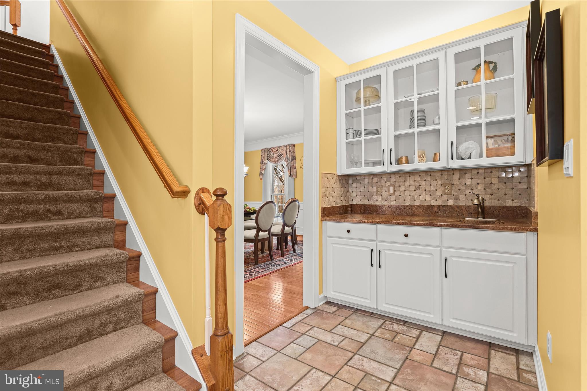 8061 Hunterbrooke Lane Fulton, MD 20759 - Photo 23 of 90 Wet Bar with Display Cabinetry
