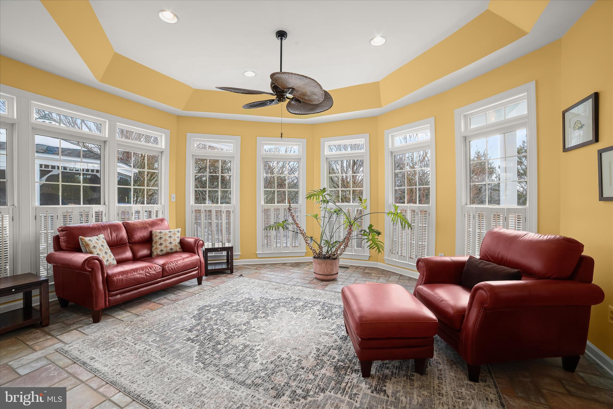 8061 Hunterbrooke Lane Fulton, MD 20759 - Photo 25 of 90 a living room with furniture and a floor to ceiling window