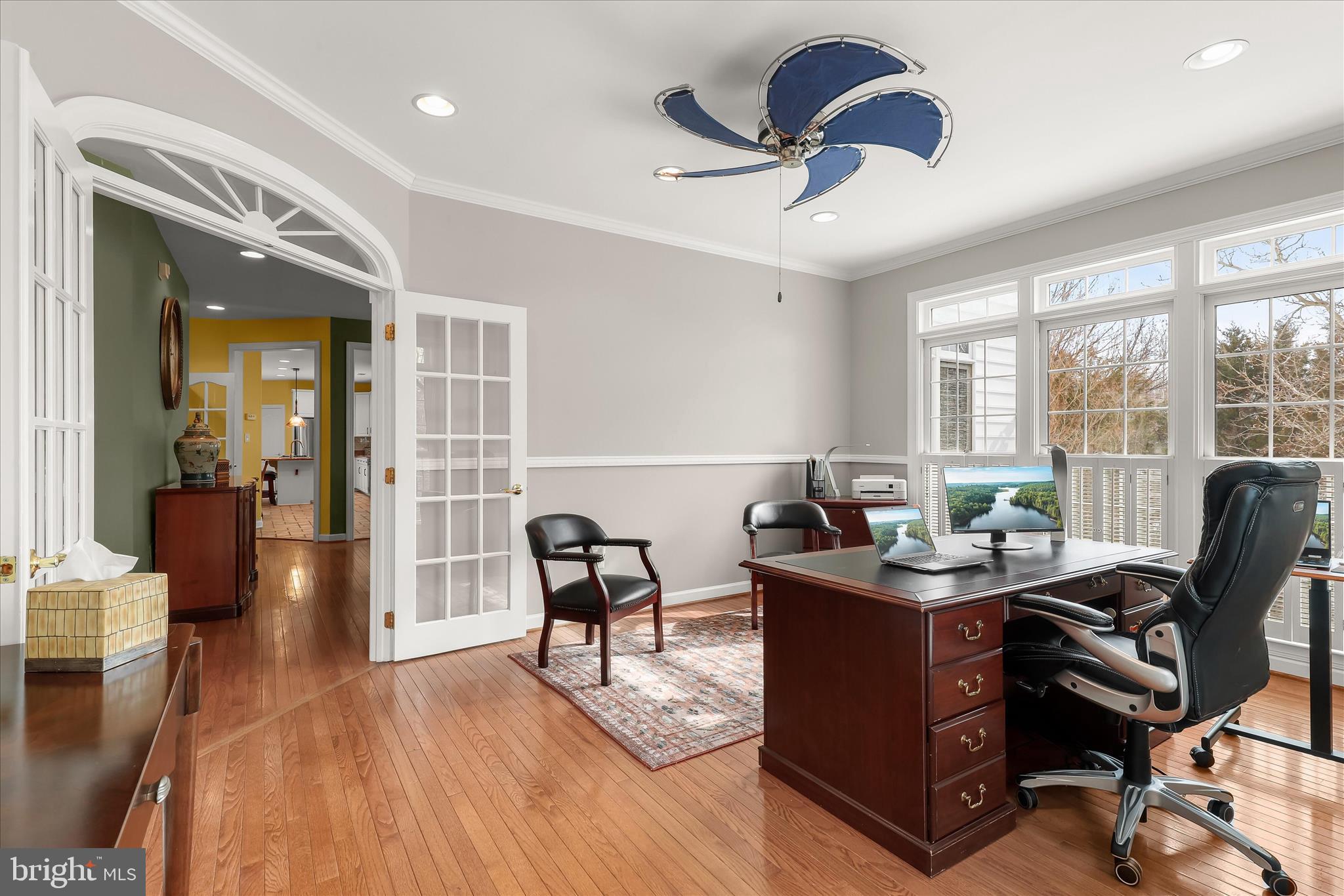 8061 Hunterbrooke Lane Fulton, MD 20759 - Photo 30 of 90 a view of a workspace with furniture and a window