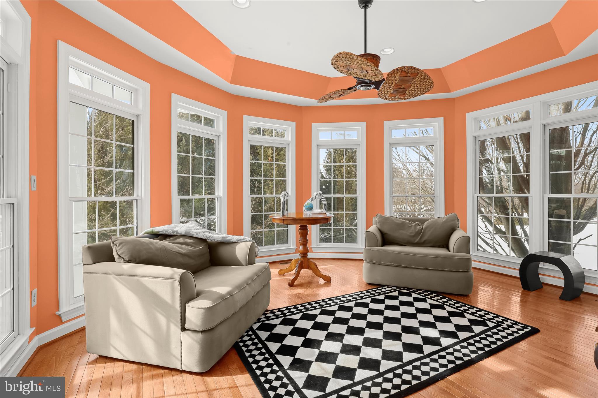 8061 Hunterbrooke Lane Fulton, MD 20759 - Photo 32 of 90 a living room with furniture and a floor to ceiling window