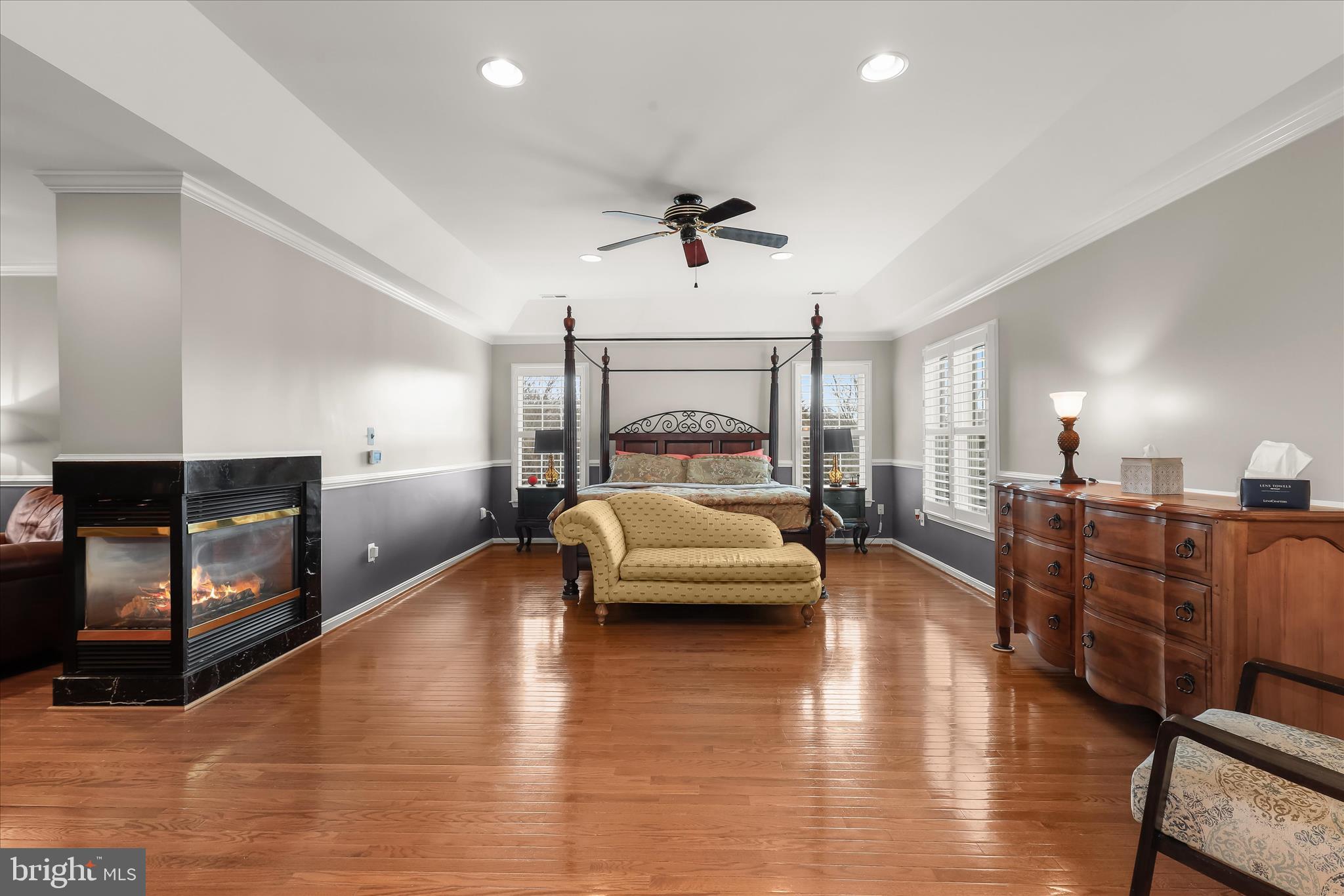 8061 Hunterbrooke Lane Fulton, MD 20759 - Photo 35 of 90 a living room with furniture and a fireplace