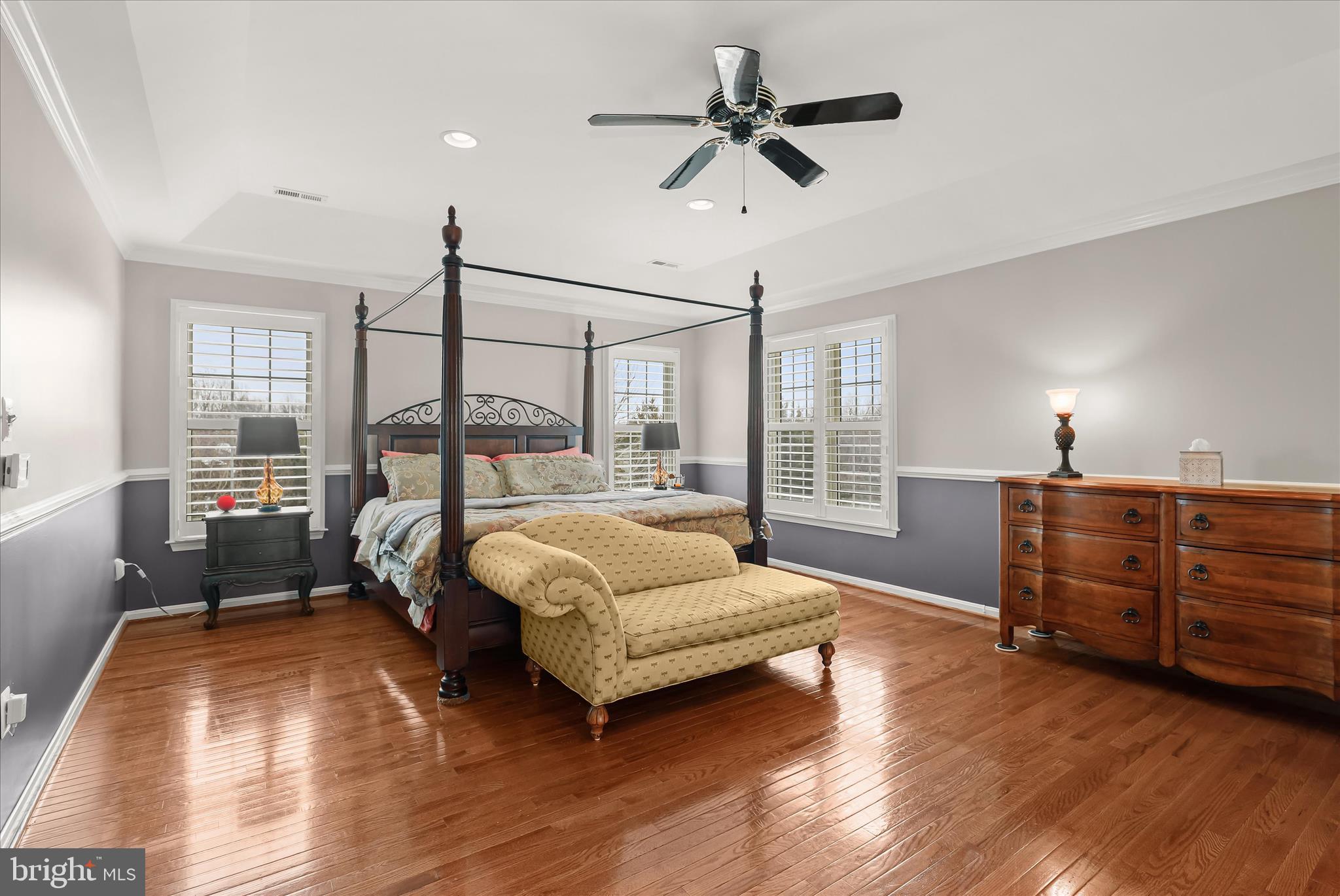 8061 Hunterbrooke Lane Fulton, MD 20759 - Photo 36 of 90 a bedroom with a bed chandelier and a window
