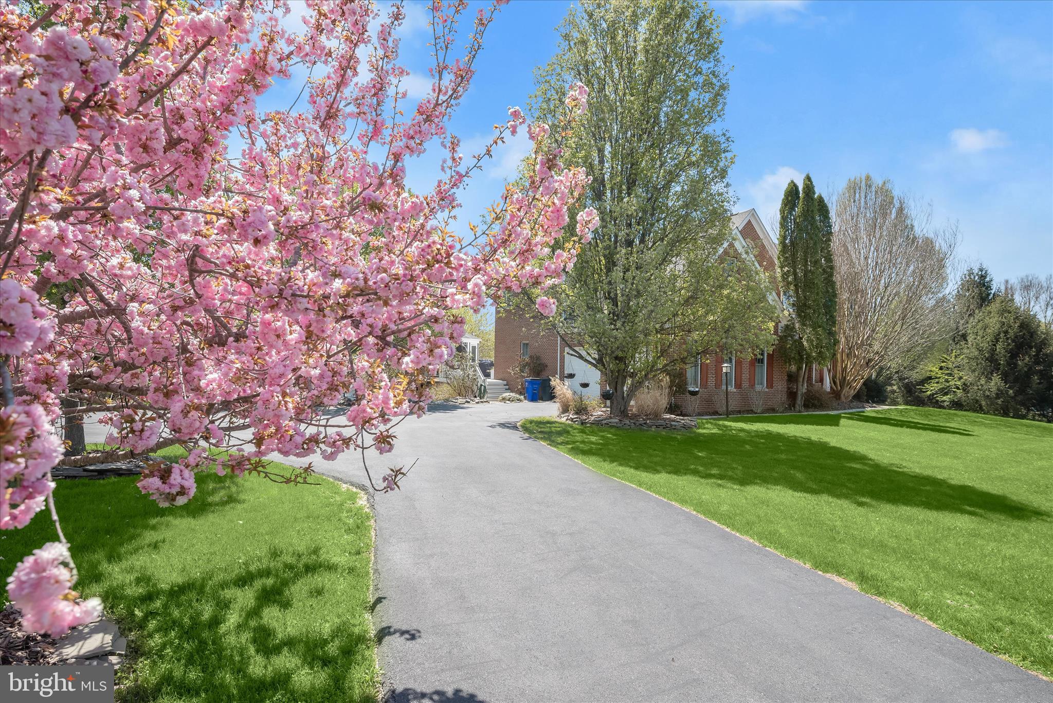 8061 Hunterbrooke Lane Fulton, MD 20759 - Photo 4 of 90 Private Driveway & Seasonal Blooms