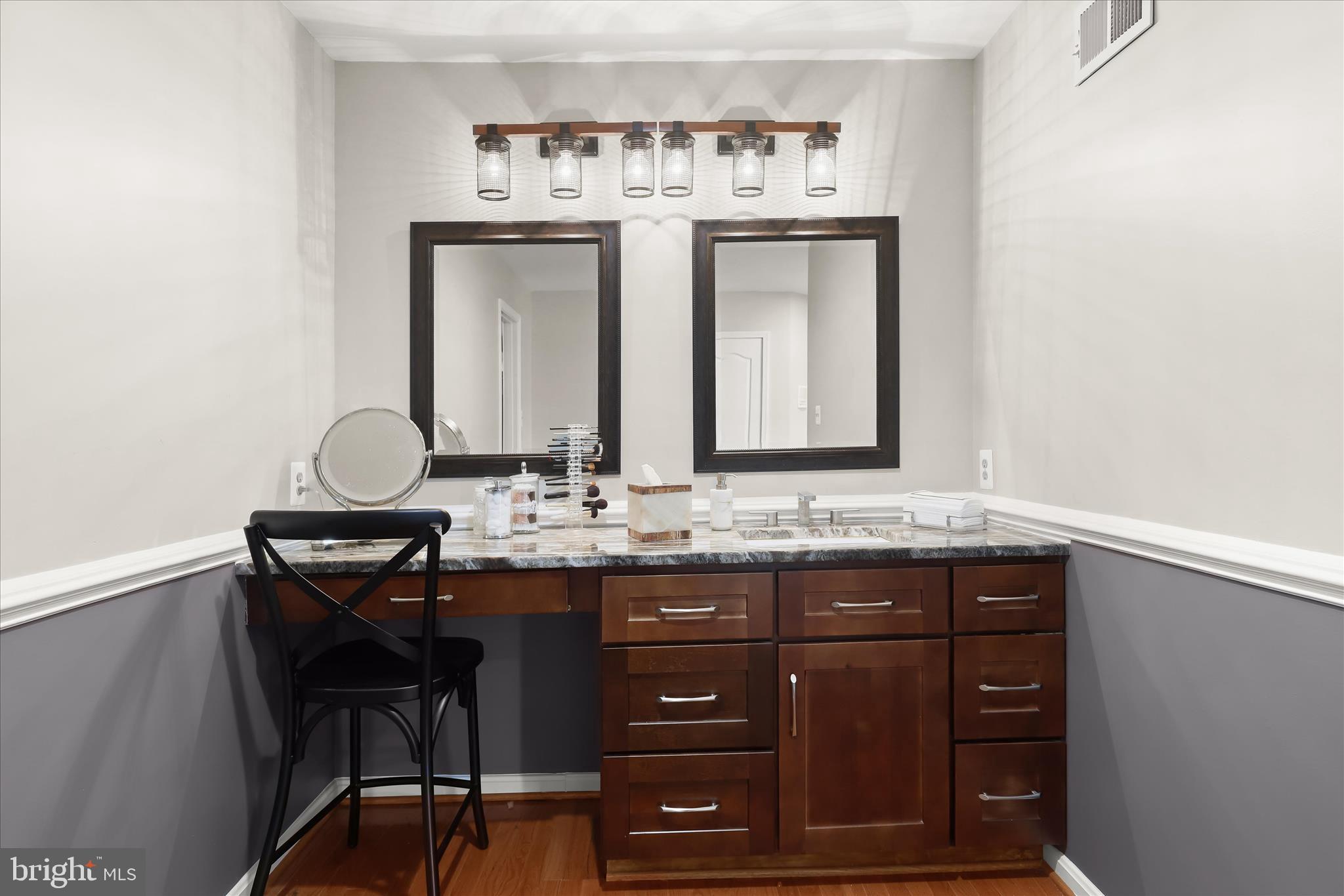 8061 Hunterbrooke Lane Fulton, MD 20759 - Photo 41 of 90 a bathroom with a granite countertop sink a light fixture and a mirror