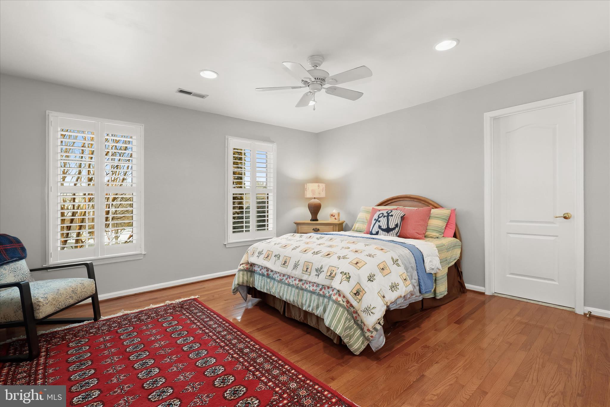 8061 Hunterbrooke Lane Fulton, MD 20759 - Photo 48 of 90 a bedroom with a bed and wooden floor