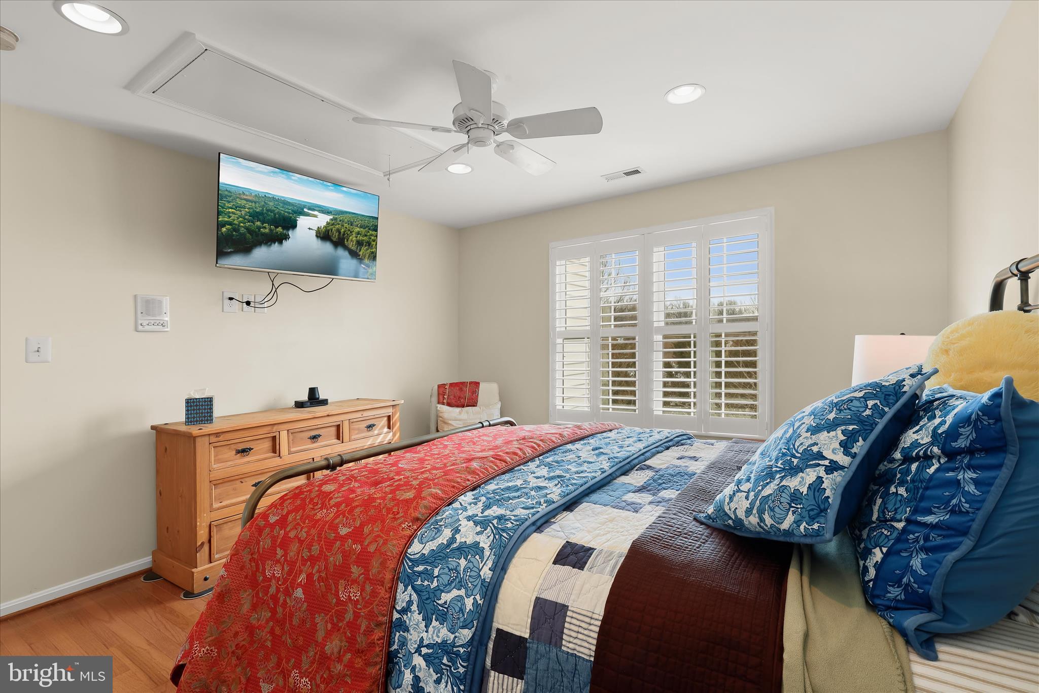 8061 Hunterbrooke Lane Fulton, MD 20759 - Photo 52 of 90 a bedroom with a bed and wooden floor