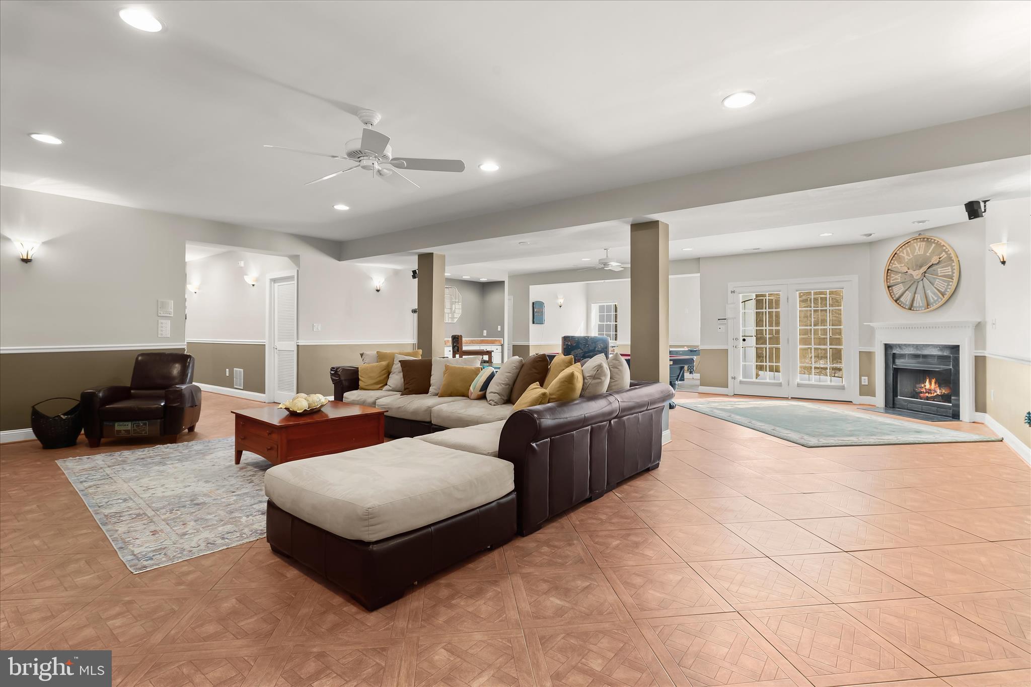 8061 Hunterbrooke Lane Fulton, MD 20759 - Photo 59 of 90 a living room with furniture large window and fireplace