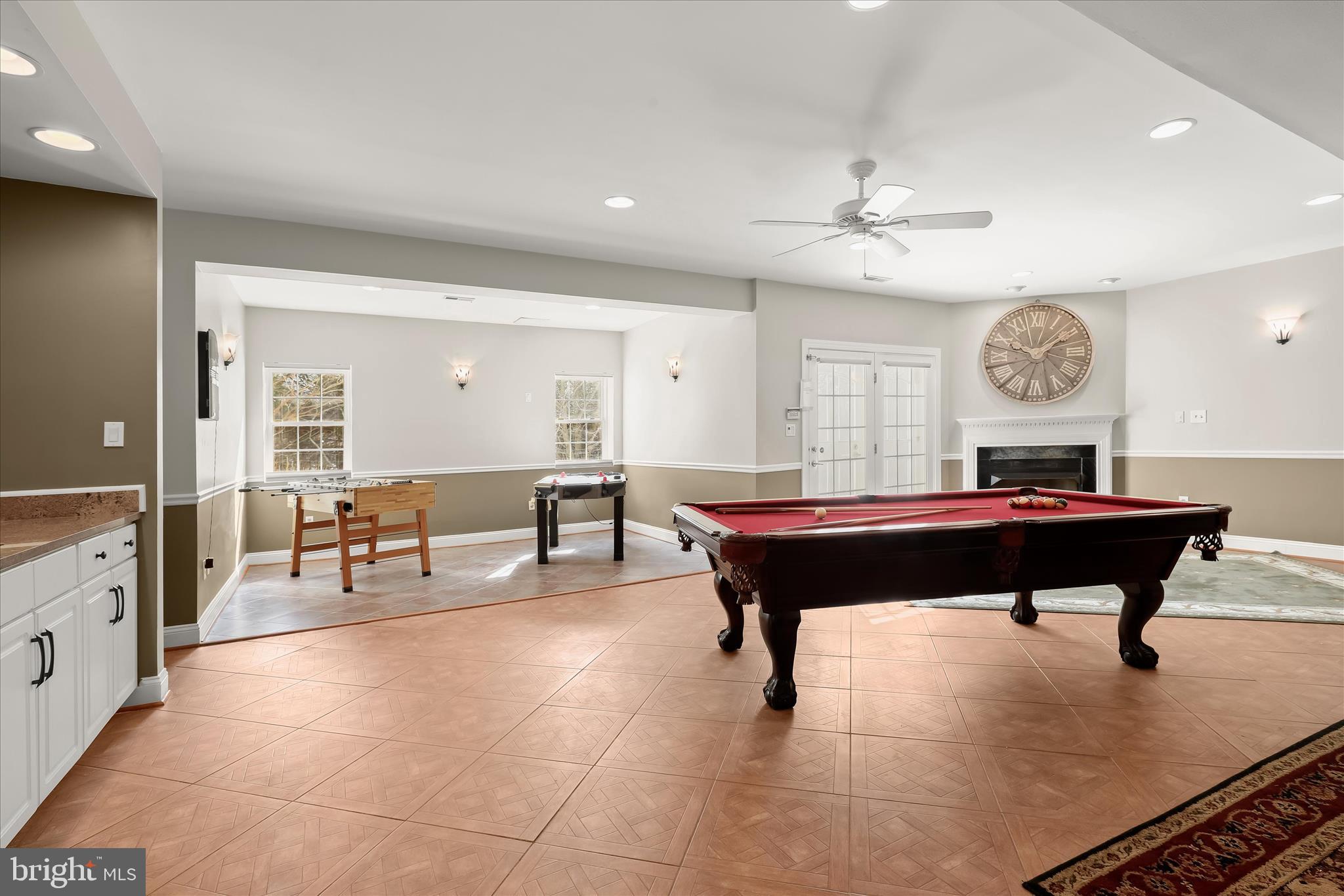 8061 Hunterbrooke Lane Fulton, MD 20759 - Photo 60 of 77 a living room with furniture a clock and a table