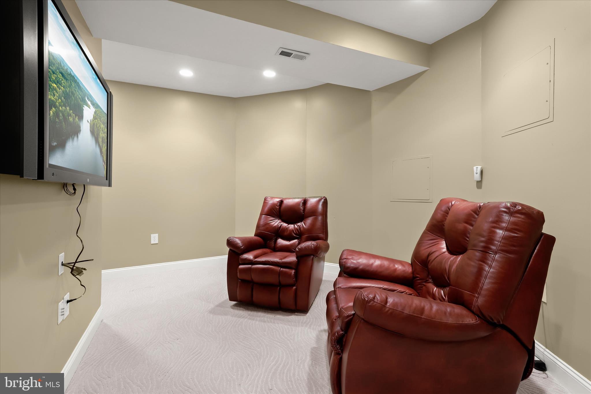 8061 Hunterbrooke Lane Fulton, MD 20759 - Photo 62 of 77 a projector room with a couch
