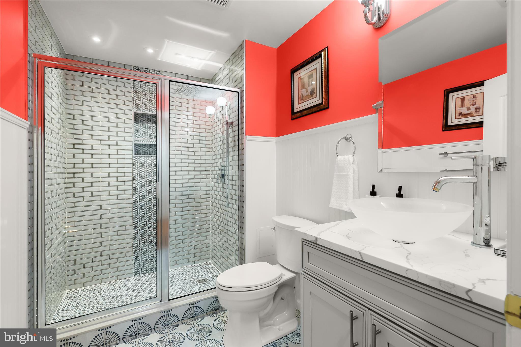 8061 Hunterbrooke Lane Fulton, MD 20759 - Photo 65 of 77 a bathroom with a sink toilet and shower