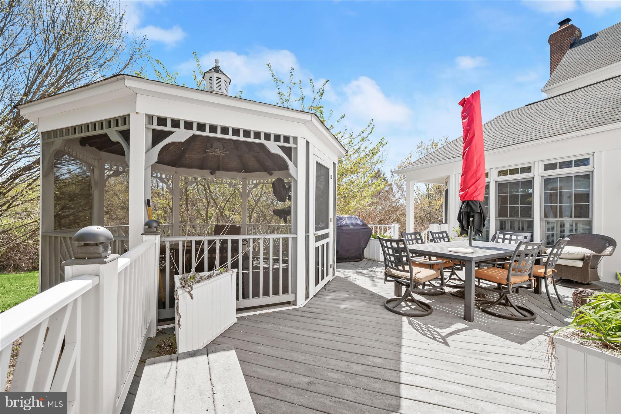 8061 Hunterbrooke Lane Fulton, MD 20759 - Photo 69 of 77 a view of a chairs and table in patio with wooden fence
