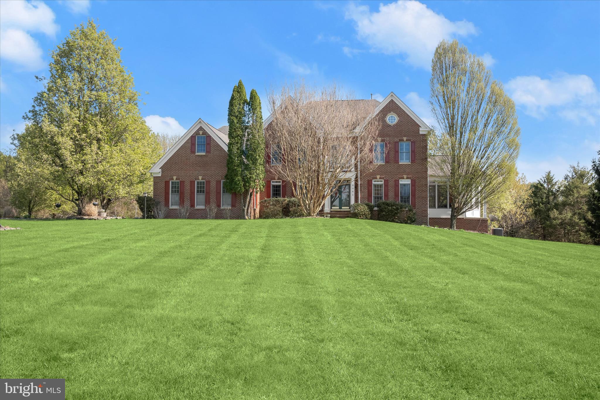 8061 Hunterbrooke Lane Fulton, MD 20759 - Photo 84 of 90 a view of a front of a house with a yard