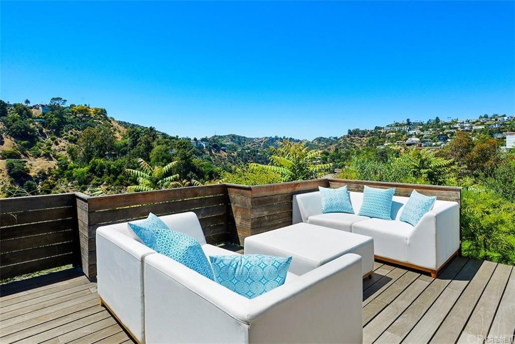8184 Mannix Drive Los Angeles, CA 90046 - Photo 2 of 53 a view of a couches in a balcony