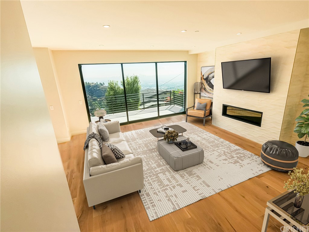 8184 Mannix Drive Los Angeles, CA 90046 - Photo 41 of 53 a living room with furniture and a flat screen tv