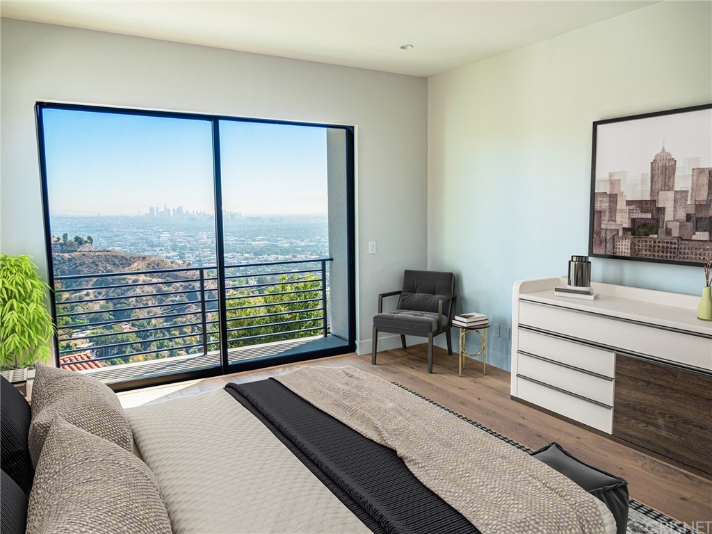 8184 Mannix Drive Los Angeles, CA 90046 - Photo 42 of 53 a bedroom with a bed and a large window