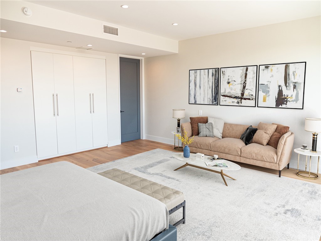 8184 Mannix Drive Los Angeles, CA 90046 - Photo 45 of 53 a bedroom with a bed and couch