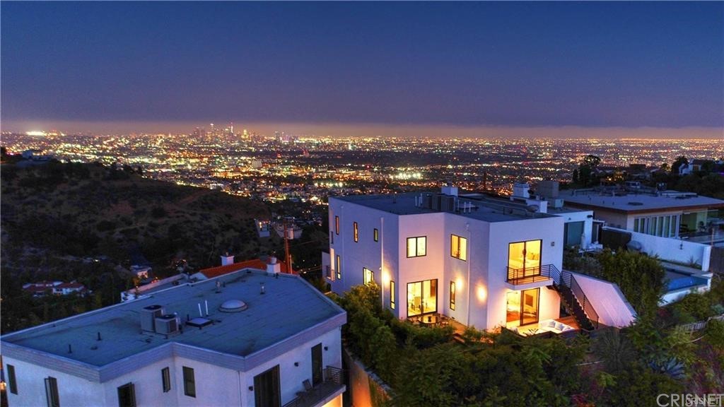 8184 Mannix Drive Los Angeles, CA 90046 - Photo 9 of 53 an aerial view of multiple houses with a yard