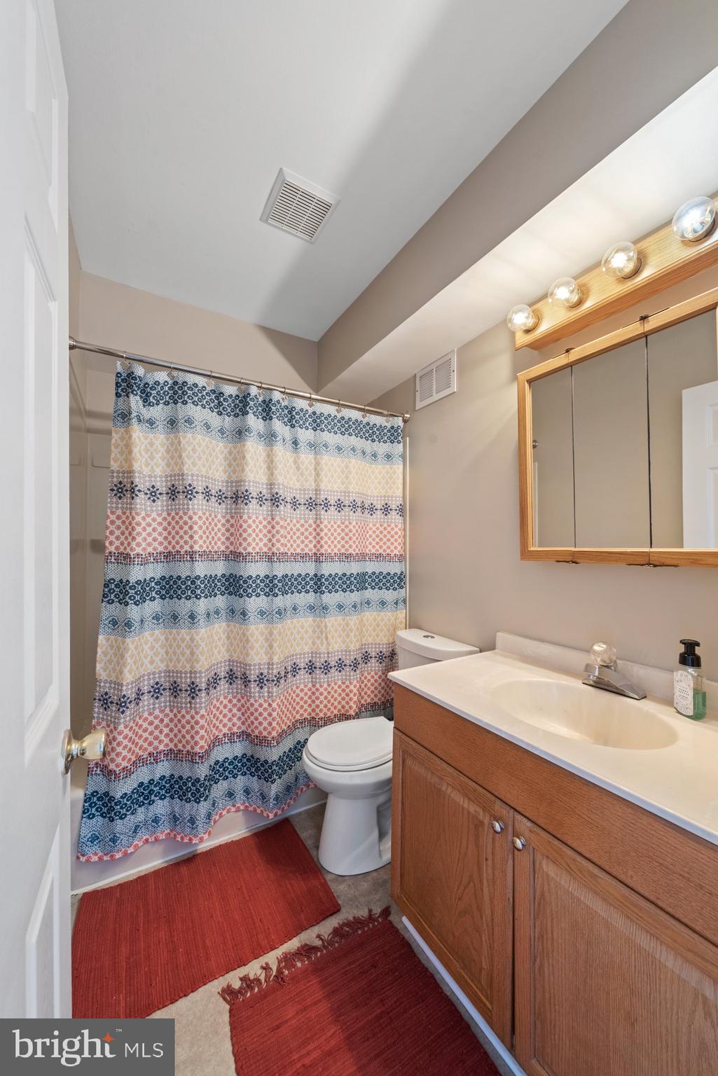 519 Epsom Road, Unit TB Towson, MD 21286 - Photo 19 of 24 With vanity, tri-fold mirror & cabinet...