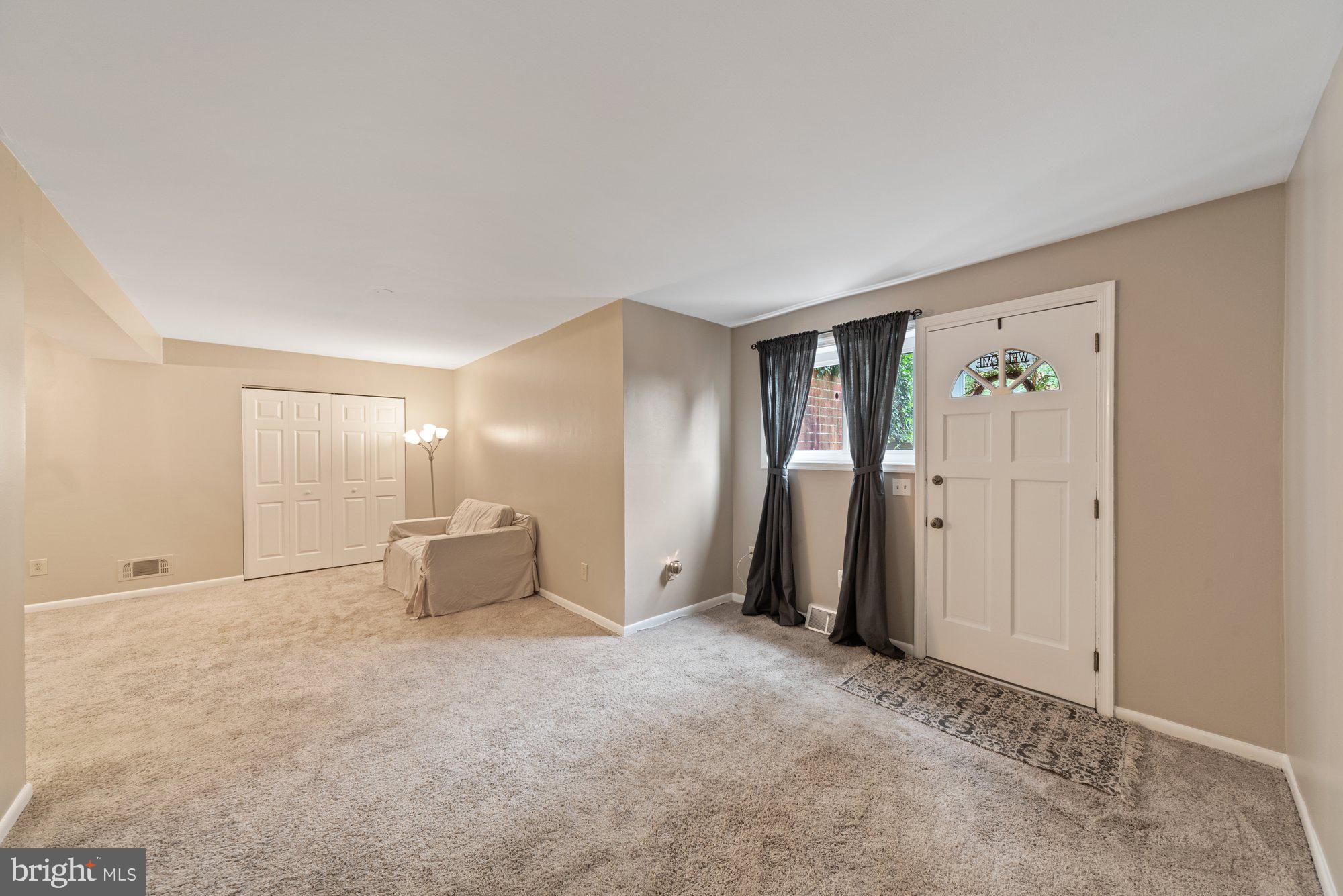 519 Epsom Road, Unit TB Towson, MD 21286 - Photo 3 of 24 And spacious living area with attached dining "L"