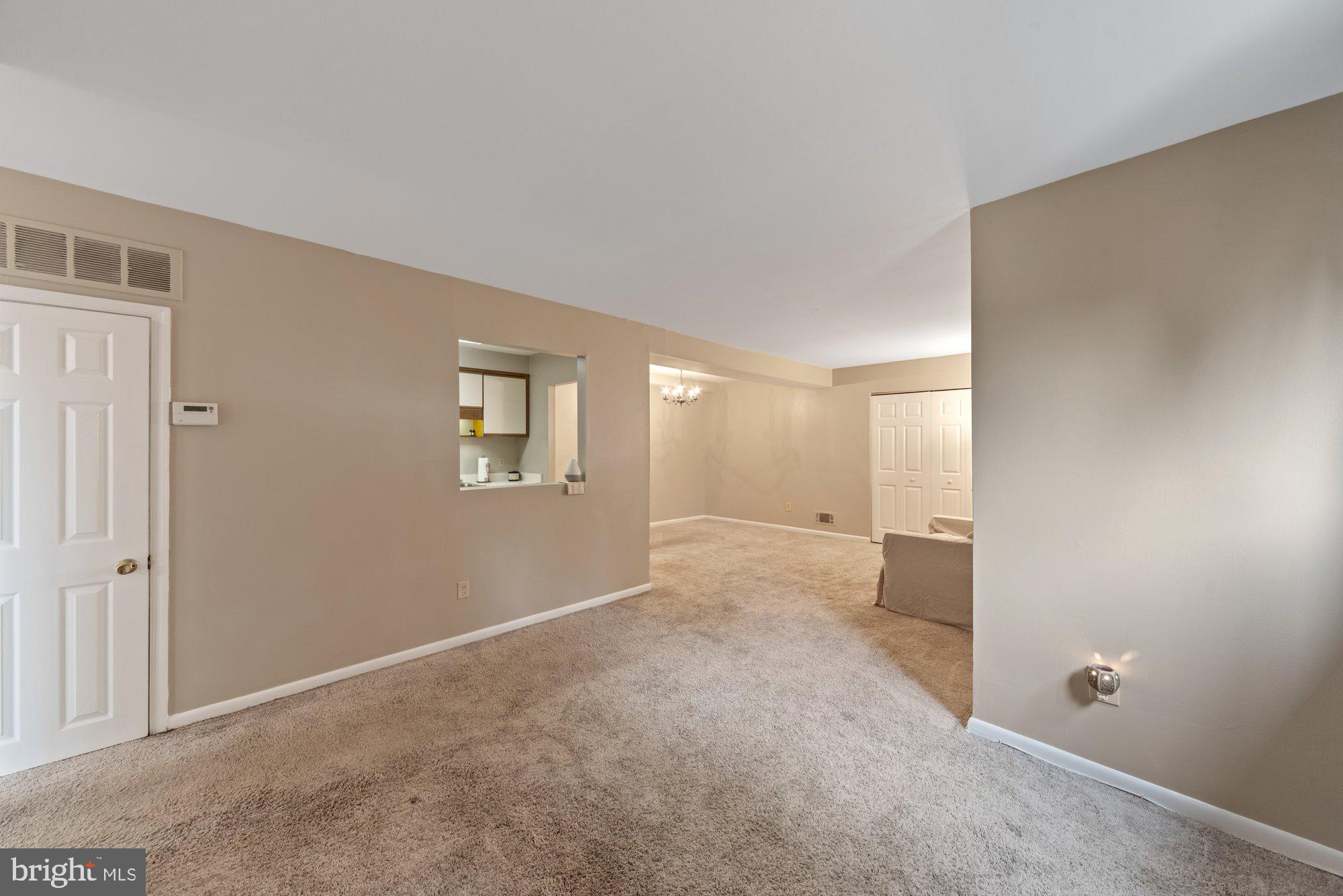 519 Epsom Road, Unit TB Towson, MD 21286 - Photo 5 of 24 Pass through to the kitchen creates a nice flow.