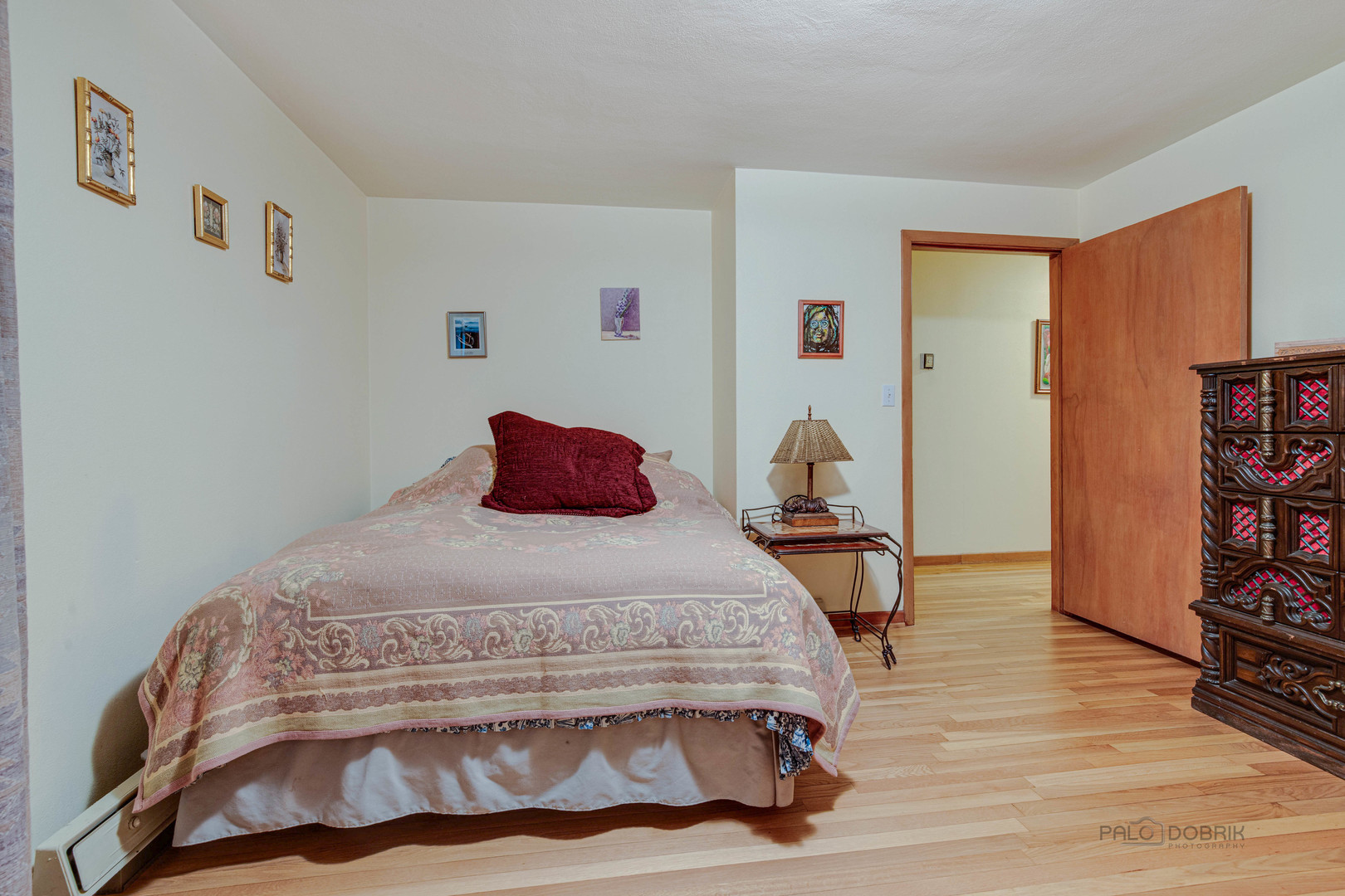 260 North St Marys Road Libertyville, IL 60048 - Photo 16 of 34 a bedroom with a bed and wooden floor