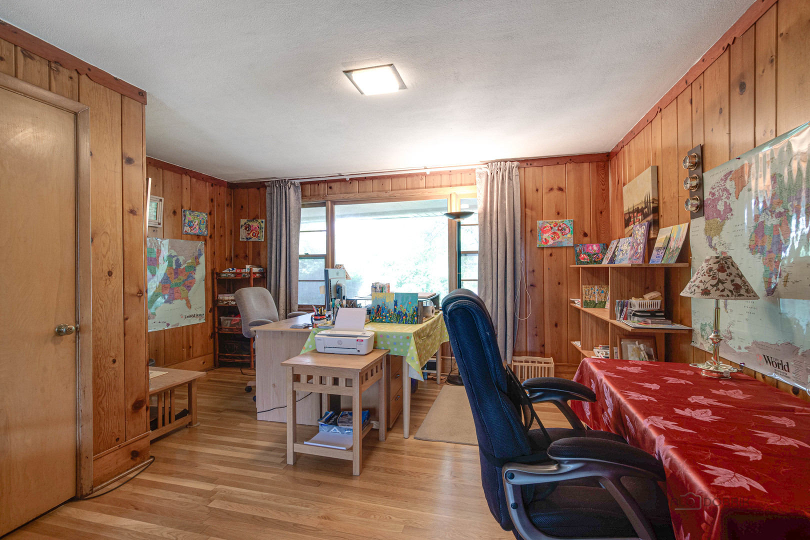 260 North St Marys Road Libertyville, IL 60048 - Photo 20 of 34 a living room with furniture a large window and wooden floor