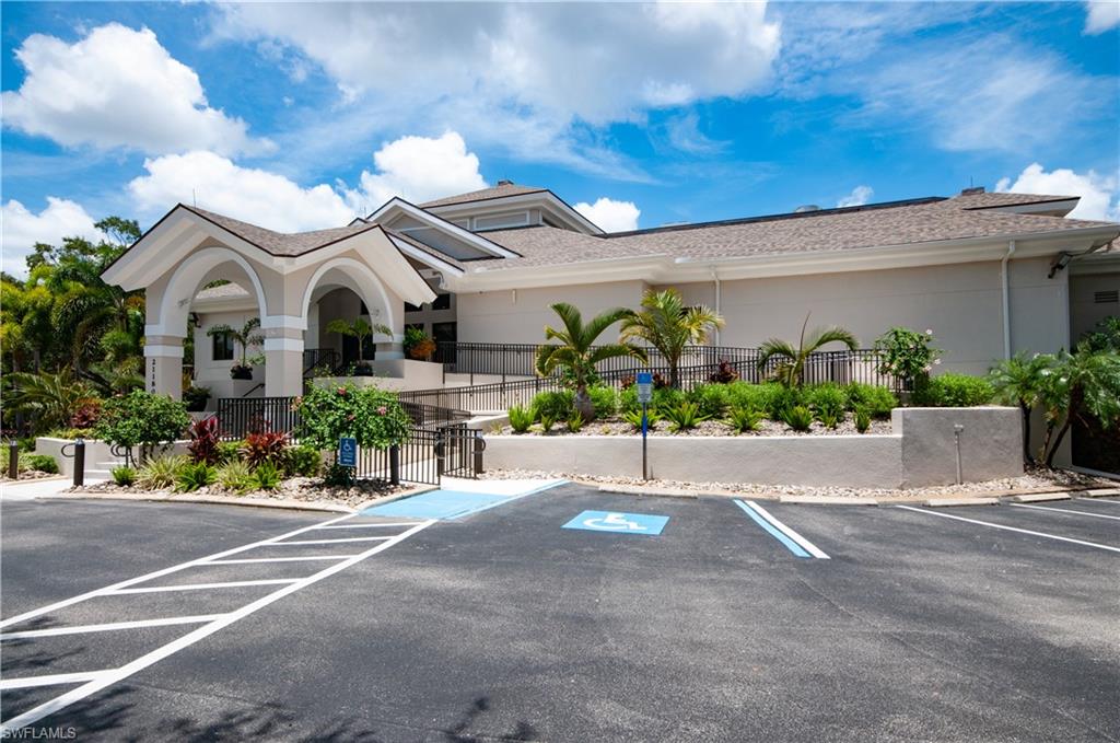 20991 Rivers Ford Estero, FL 33928 - Photo 29 of 32 a front view of a house with a yard and a garage