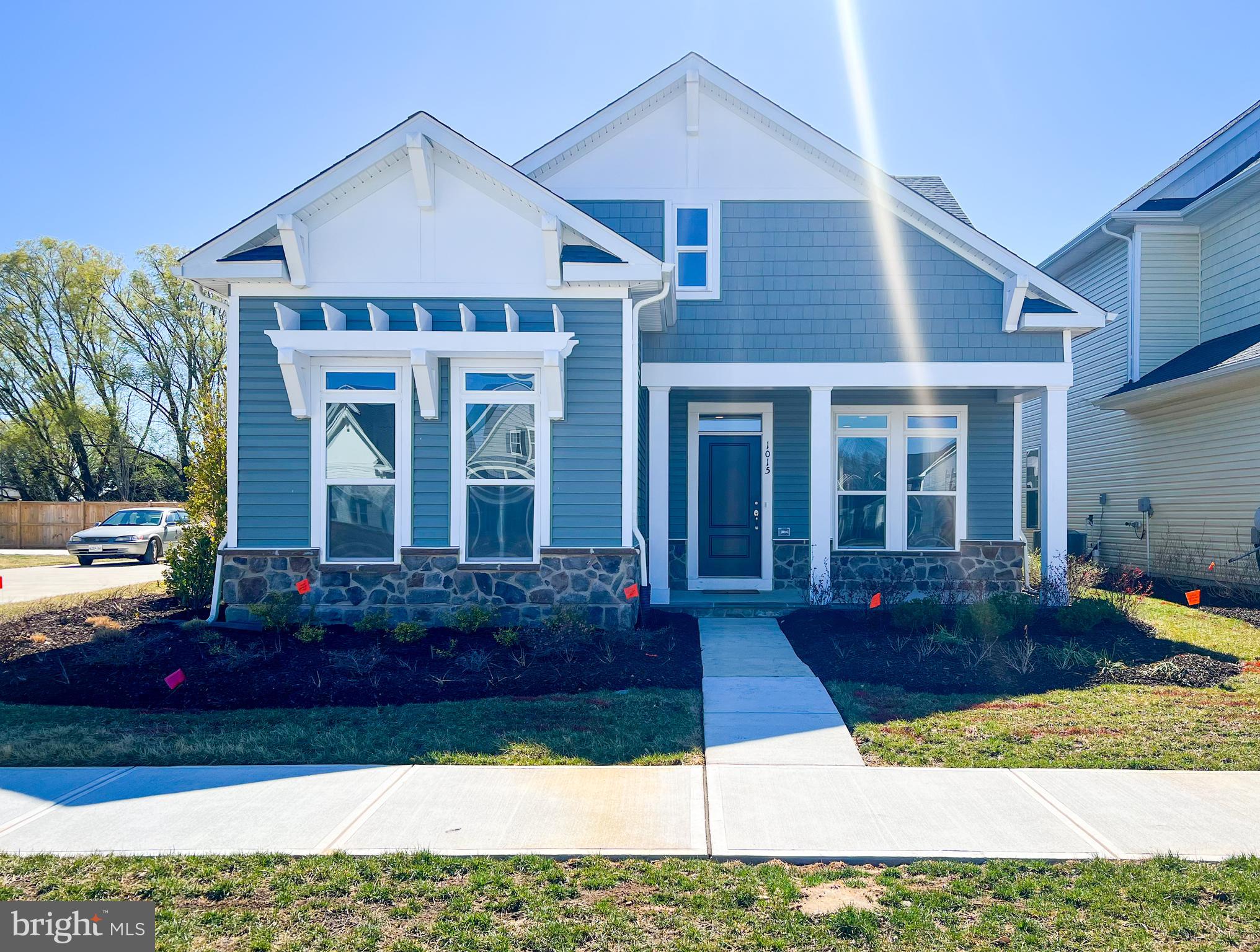 1015 Champlain Court Trappe, MD 21673 - Photo 1 of 38 a front view of a house with a yard