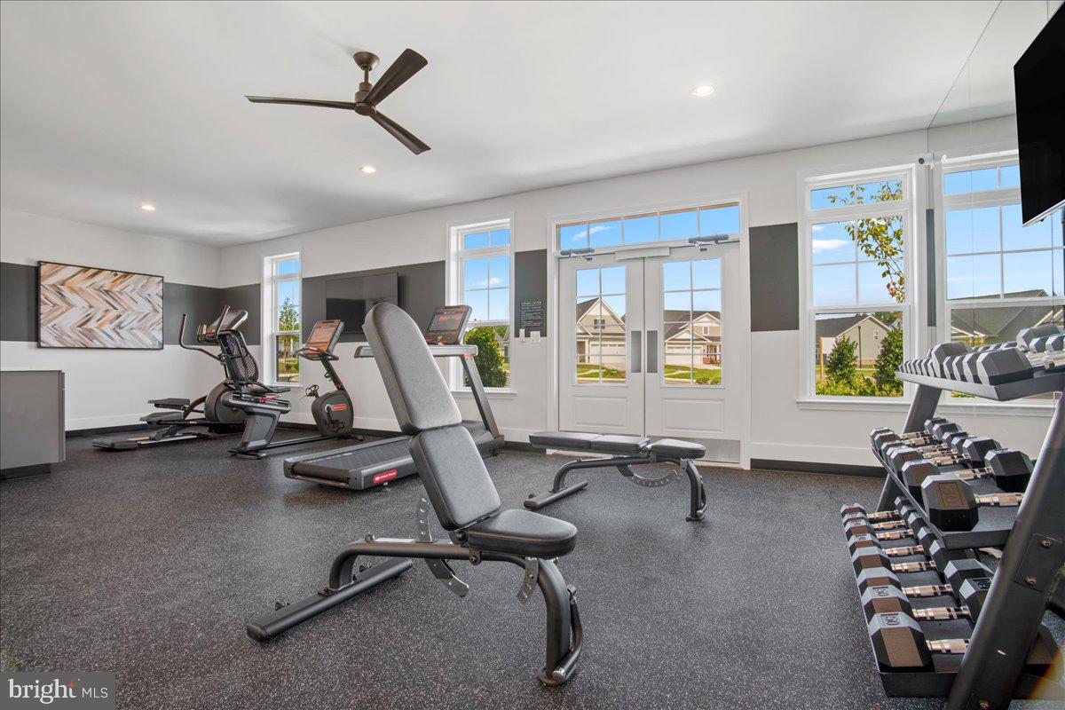 1015 Champlain Court Trappe, MD 21673 - Photo 18 of 38 a view of a room with gym equipment