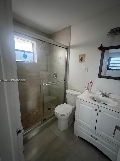 6780 Southwest 44th Street, Unit 16 Miami, FL 33155 - Photo 9 of 9 a bathroom with a sink toilet and shower