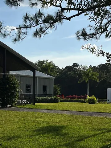 a house view with a garden space
