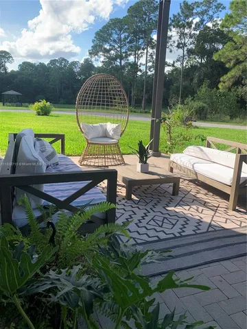 a lake view with a play ground in front of it