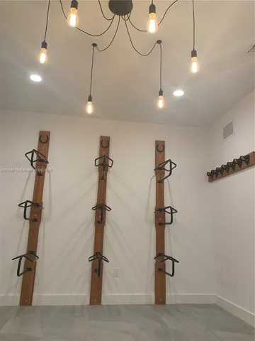 a bathroom with a shower and a toilet