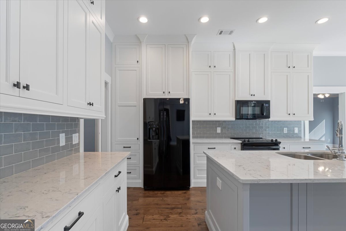 1750 Reids Ferry Road Buckhead, GA 30625 - Photo 11 of 57 a kitchen with stainless steel appliances granite countertop a refrigerator and a stove
