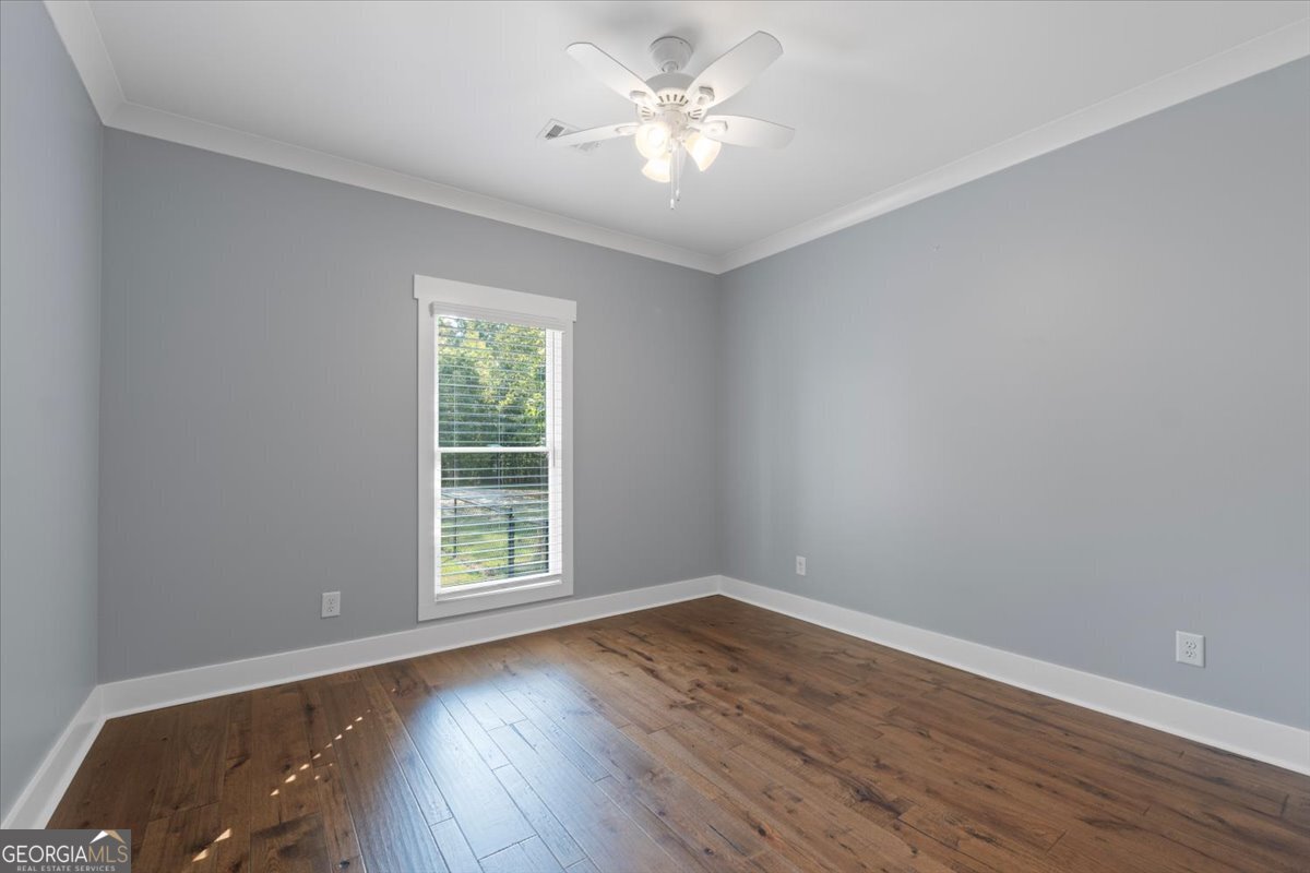1750 Reids Ferry Road Buckhead, GA 30625 - Photo 15 of 57 wooden floor in an empty room with a window