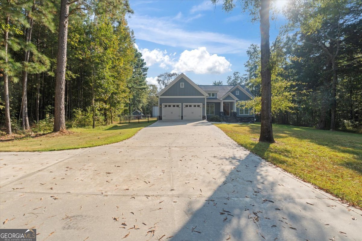 1750 Reids Ferry Road Buckhead, GA 30625 - Photo 40 of 57 a view of a house with basketball court