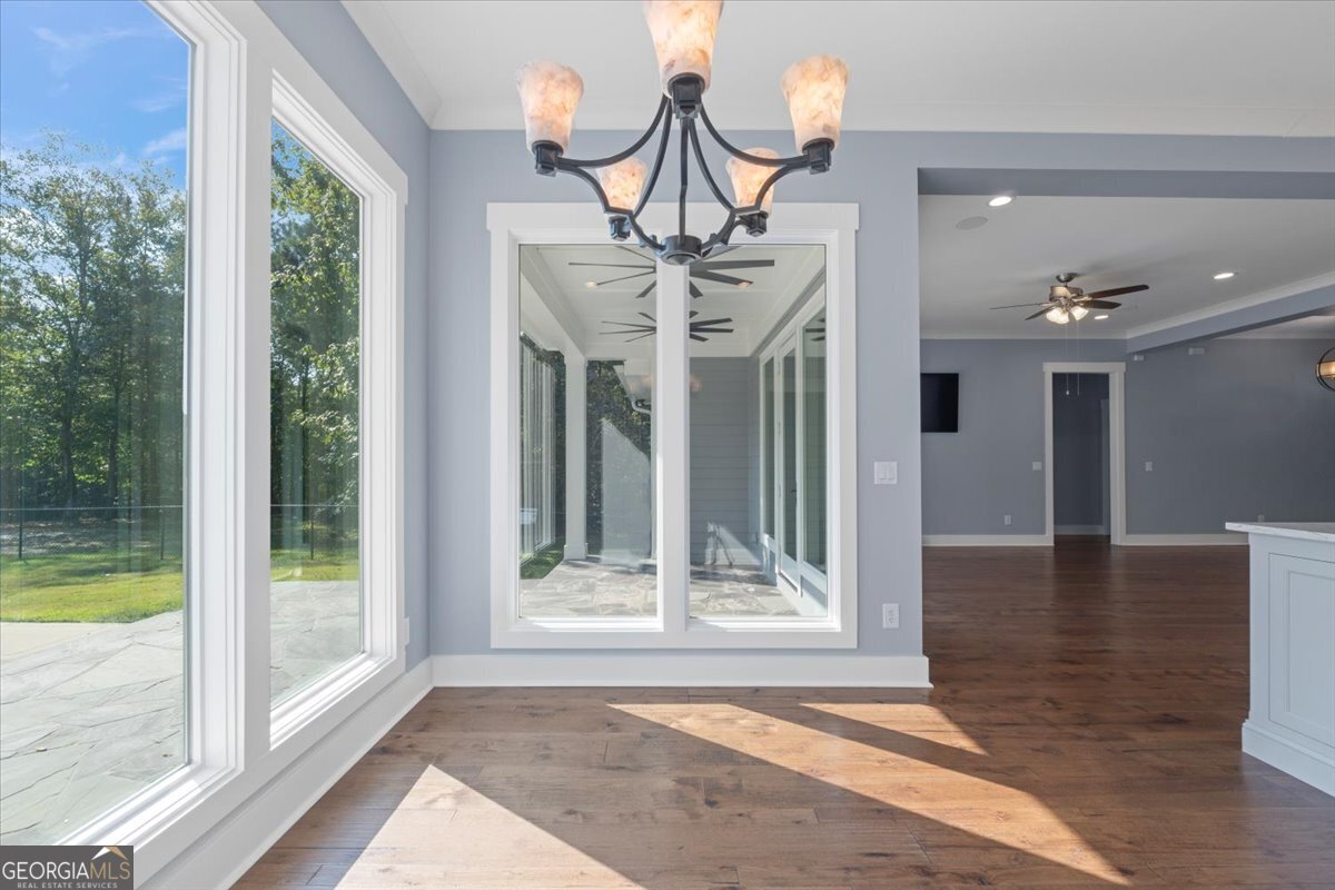 1750 Reids Ferry Road Buckhead, GA 30625 - Photo 4 of 57 a view of a livingroom with a floor to ceiling window and chandelier