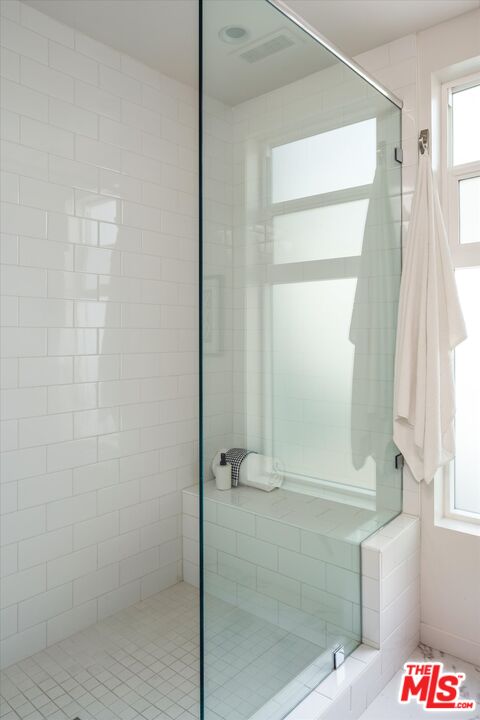 1925 Griffith Park Boulevard Los Angeles, CA 90039 - Photo 16 of 28 a bathroom with a bath tub and glass door