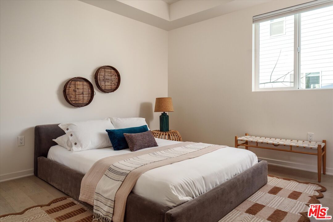 1925 Griffith Park Boulevard Los Angeles, CA 90039 - Photo 17 of 28 a bedroom with a bed and a window